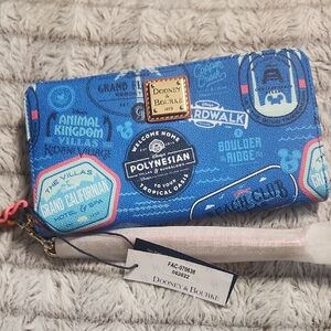 Dooney & Bourke Blue Travel Patch Zip-Around Wallet with Gold Plaque